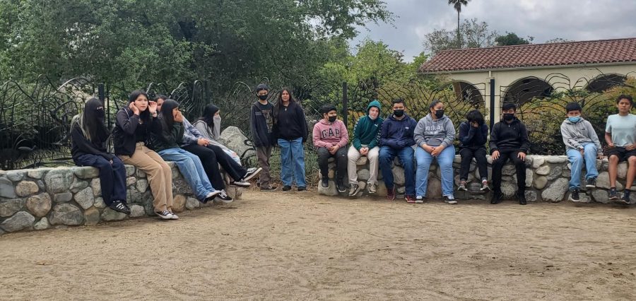 Newells students take a break from their nature walk near the L.A. River.